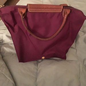Longchamp Bags - Longchamp burgundy tote. Like new. Folds up. Longchamp Bags - Longchamp burgundy tote. Like new. Folds up.